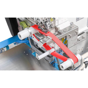 Supra Sewing Online, Llc industrial sewing machine attaching red collar to garment with photocell alignment and vacuum waste management.