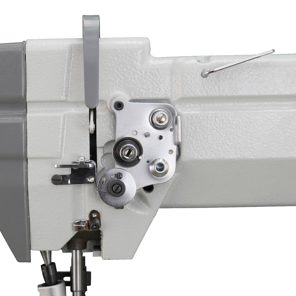 Supra Sewing Online, Llc Speedway SW 9910 industrial sewing machine detail showing roller foot and feed mechanism.